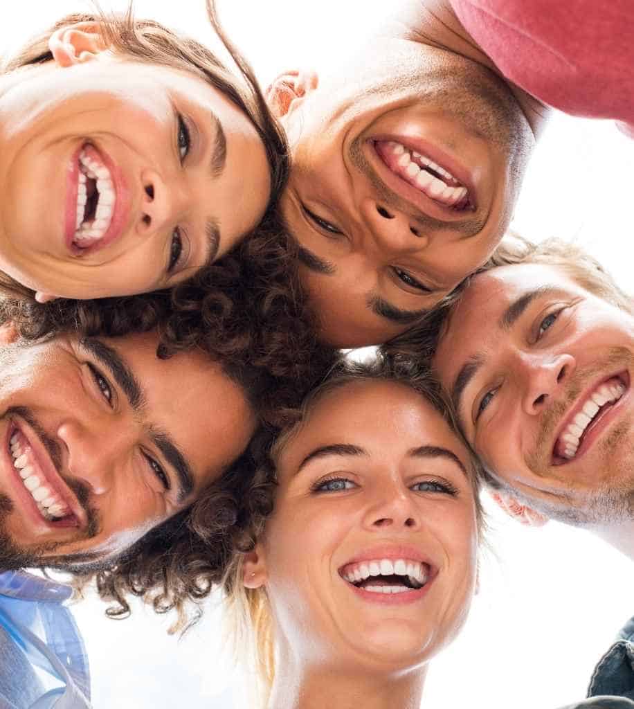 Smiling person showcasing white teeth after laser whitening treatment Nottingham